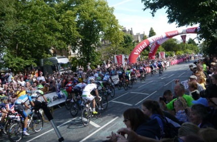 The riders approaching the 1km to go marker just up the road from the hospital