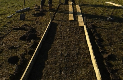 Laying out another section of the path