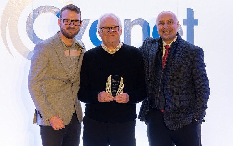 Adrian Ashurst receiving his award from JJ Chalmers and Dr Tony Romero