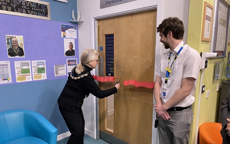 Cllr Sophie Russe cutting the ribbon to open Haywood Ward