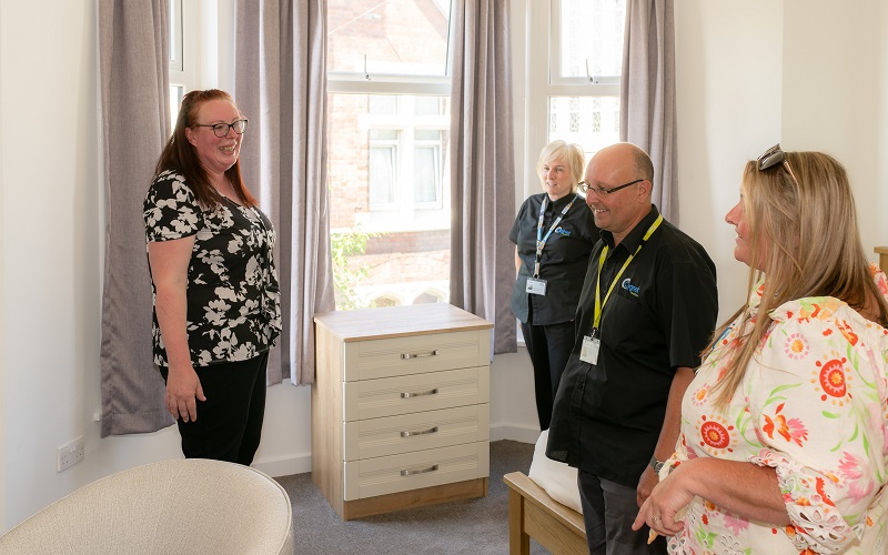 Team leader Rhiannon Lewis giving a tour of the new service at the opening day.