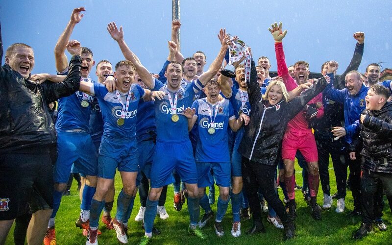 The Mold Alex FC team celebrating their win