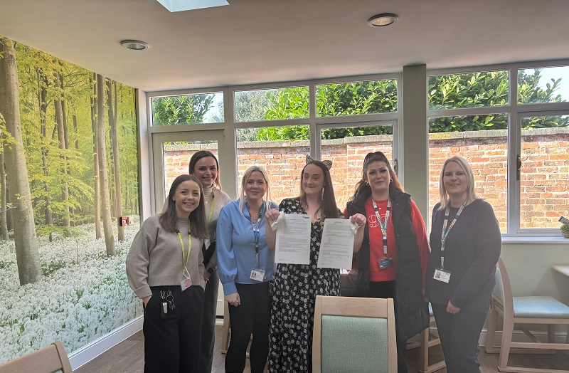 Kerry with the Maple House team