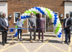 Councillor Kevin Johnson, the Mayor of Kidsgrove cutting the ribbon to open Cygnet Hospital Kidsgrove