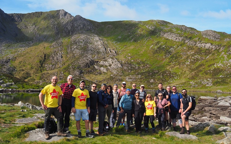 The team at the side of the small lake in Cwm Bochlwyd