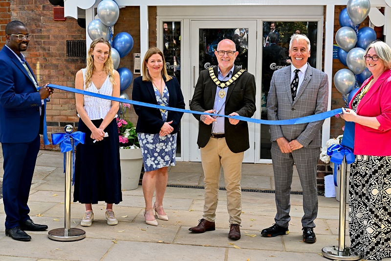 Councillor Alan Abernethy, Mayor of Heanor and Loscoe cuts the ribbon at the opening of Cygnet Elowen Hospital